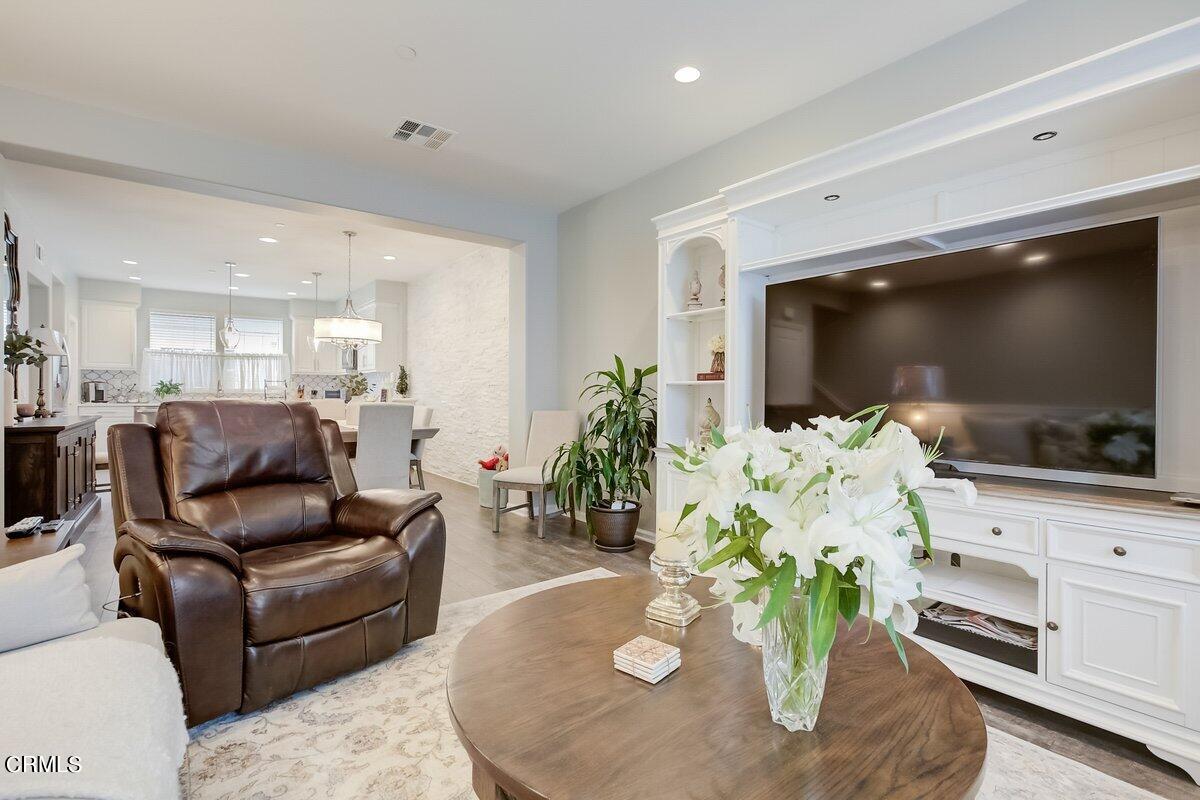 3654 Islander Walk Oxnard, CA 93035 - Photo 11 of 61 a living room with furniture and a flat screen tv