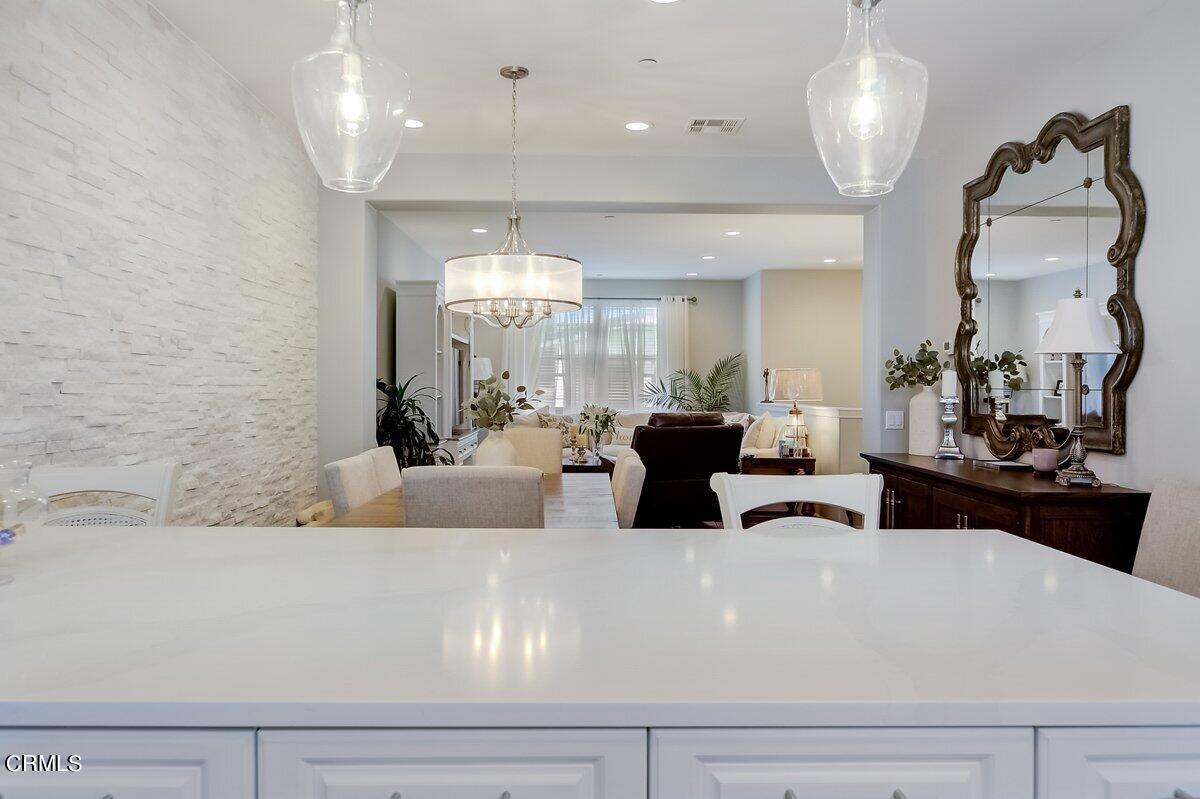 3654 Islander Walk Oxnard, CA 93035 - Photo 23 of 61 a view of a living room and kitchen