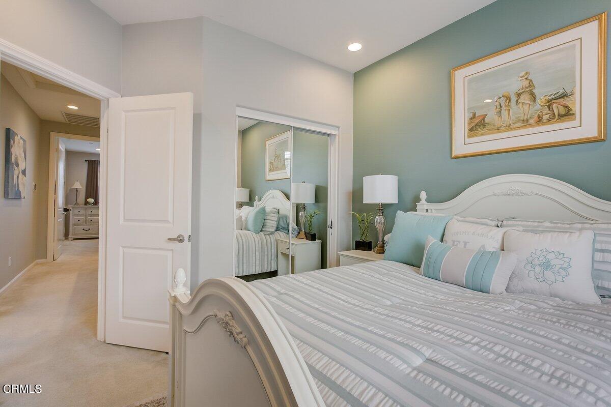 3654 Islander Walk Oxnard, CA 93035 - Photo 36 of 61 a bedroom with a bed and a painting on the wall