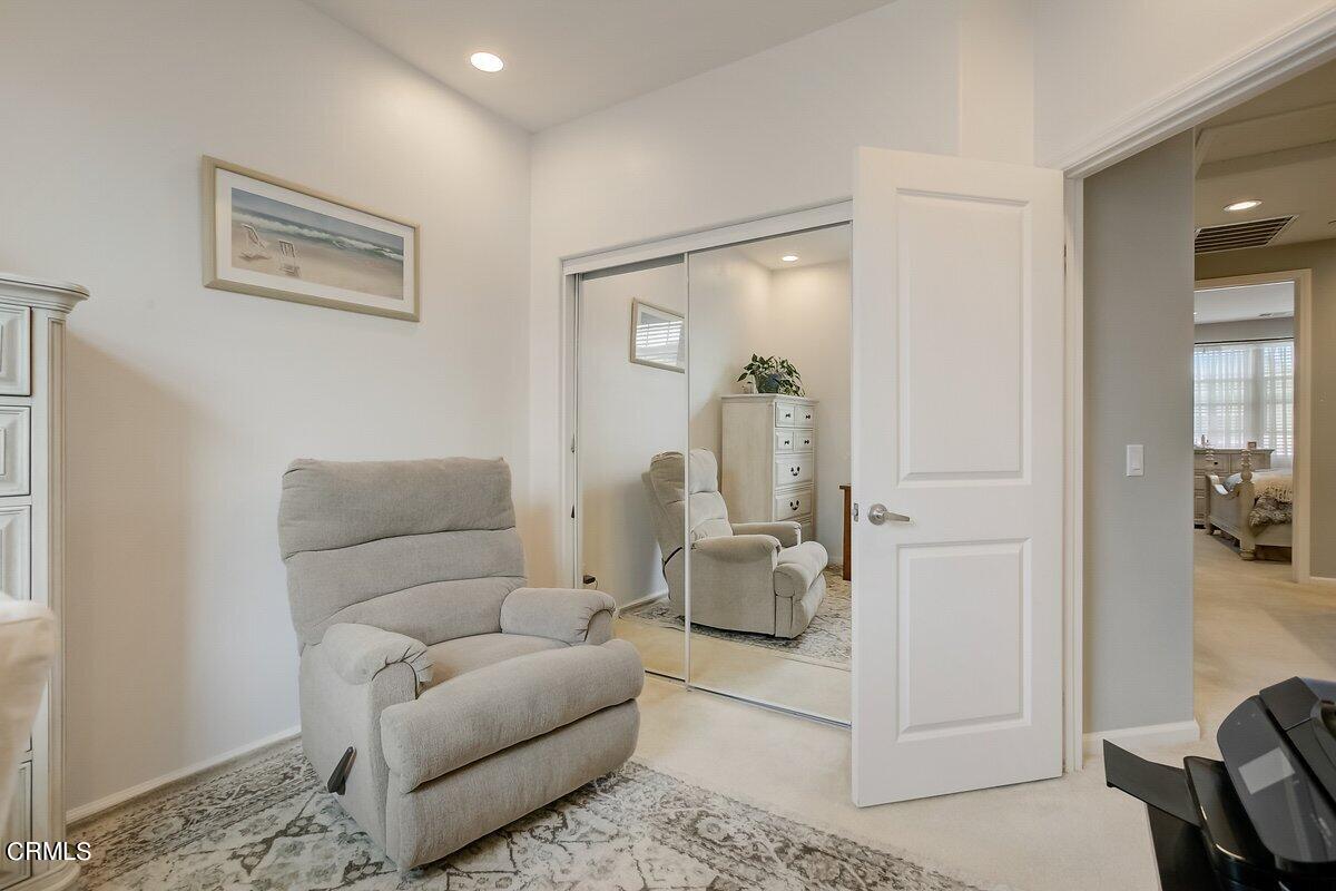 3654 Islander Walk Oxnard, CA 93035 - Photo 41 of 61 a living room with furniture and a table