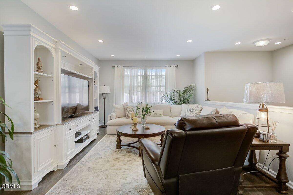 3654 Islander Walk Oxnard, CA 93035 - Photo 5 of 61 a living room with furniture and a flat screen tv
