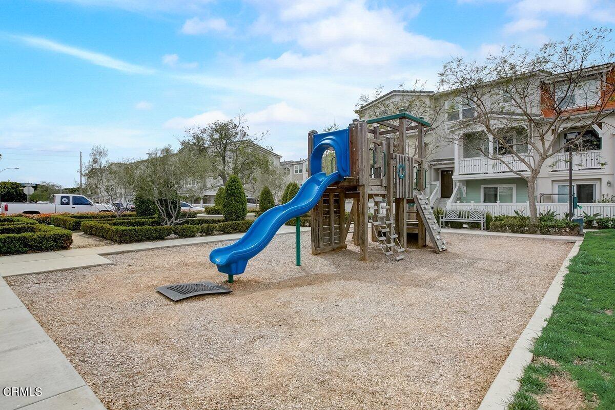 3654 Islander Walk Oxnard, CA 93035 - Photo 53 of 61 a view of a park with swings and slides