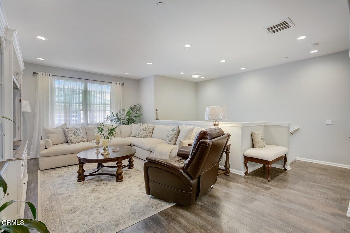 3654 Islander Walk Oxnard, CA 93035 - Photo 6 of 61 a living room with furniture and a large window