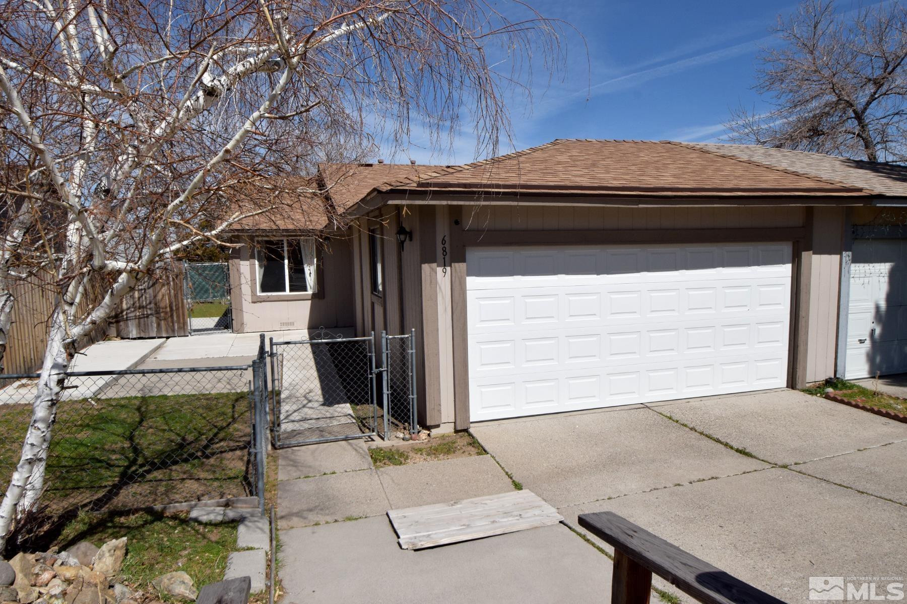 6819 Flower Street Reno, NV 89506 - Photo 1 of 1 a view of a door of the house