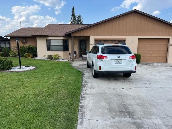 a car parked in front of a house