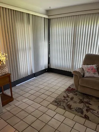 a view of a livingroom with furniture