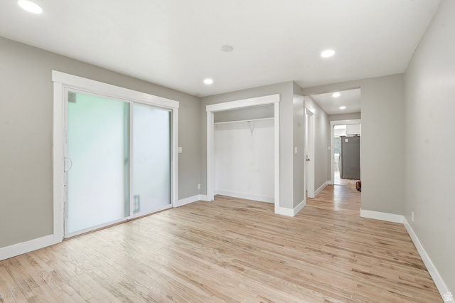 778 East 200 North Logan, UT 84321 - Photo 24 of 43 Light wood-finish flooring complements the light gray wall tones