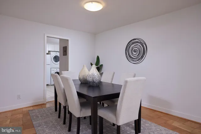a view of a table and chairs in a room
