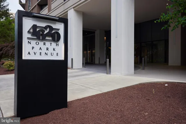 a view of a building with a tree