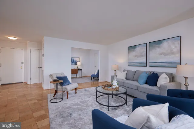 a living room with furniture and a couch