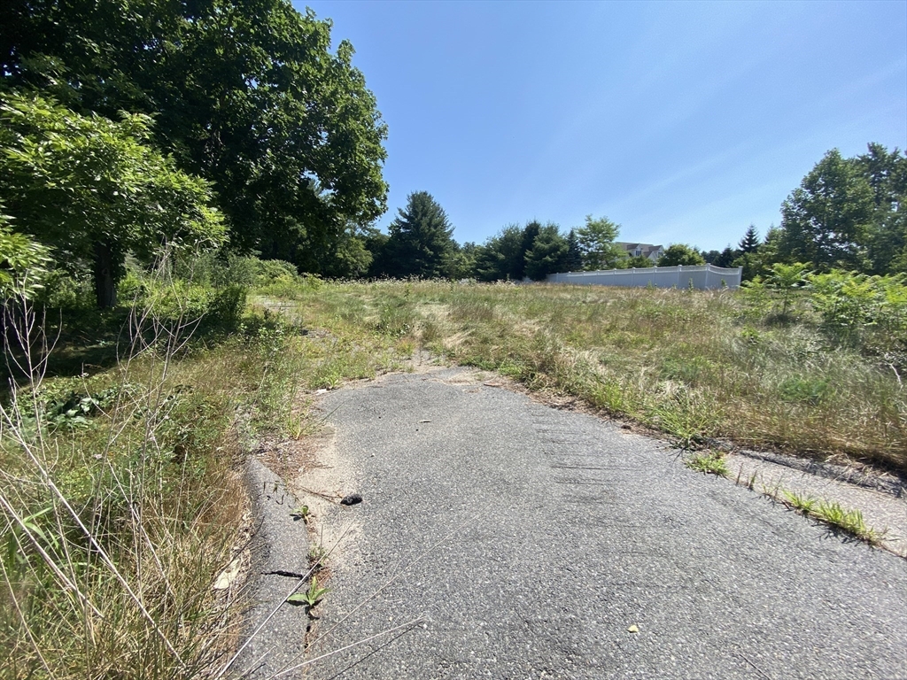 371 Providence Road Grafton, MA 01560 - Photo 12 of 13 a view of a lake with beach and outdoor space