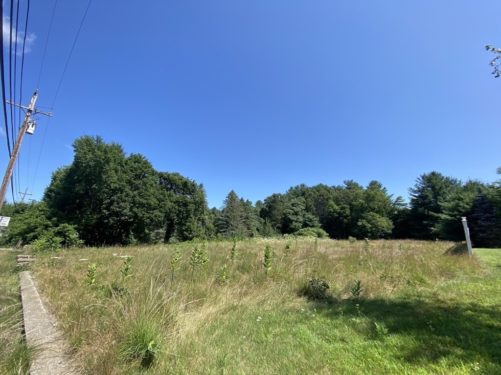 371 Providence Road Grafton, MA 01560 - Photo 10 of 13 a view of a television with a yard