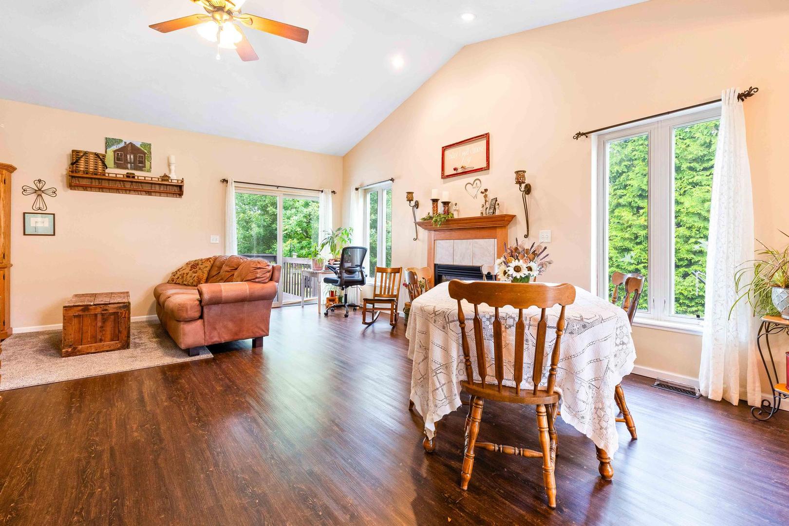 107 Labrador Lane Downs, IL 61736 - Photo 11 of 35 a living room with furniture and a large window