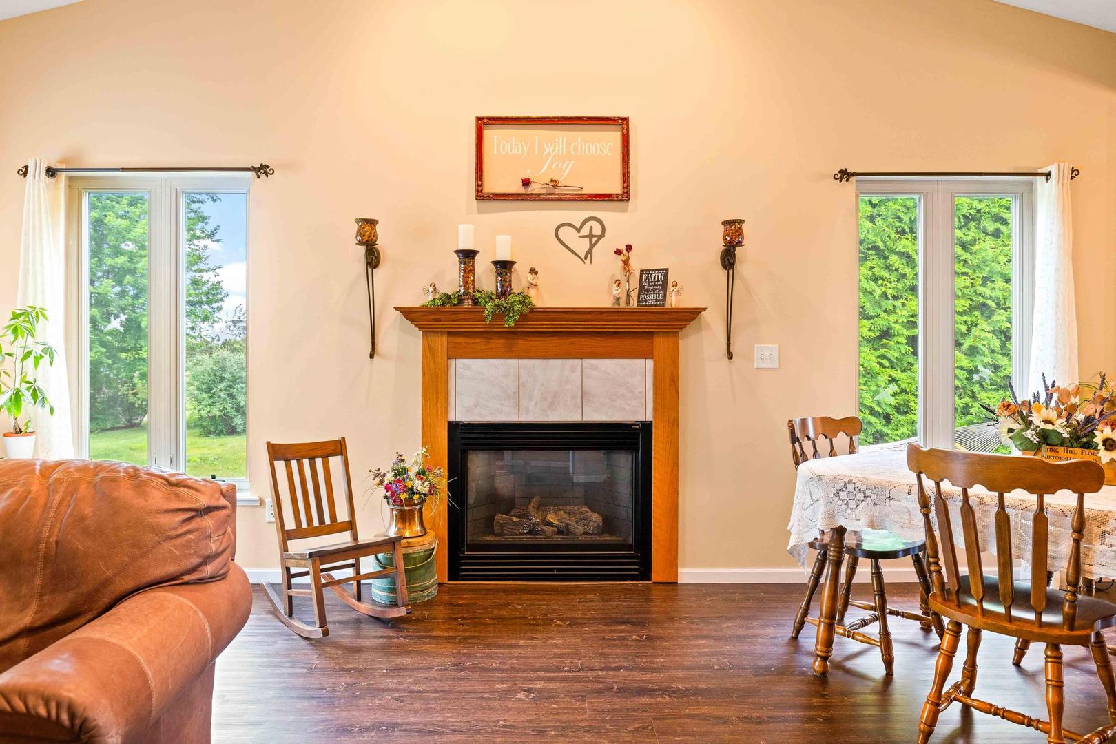 107 Labrador Lane Downs, IL 61736 - Photo 12 of 35 a living room with furniture and a fireplace