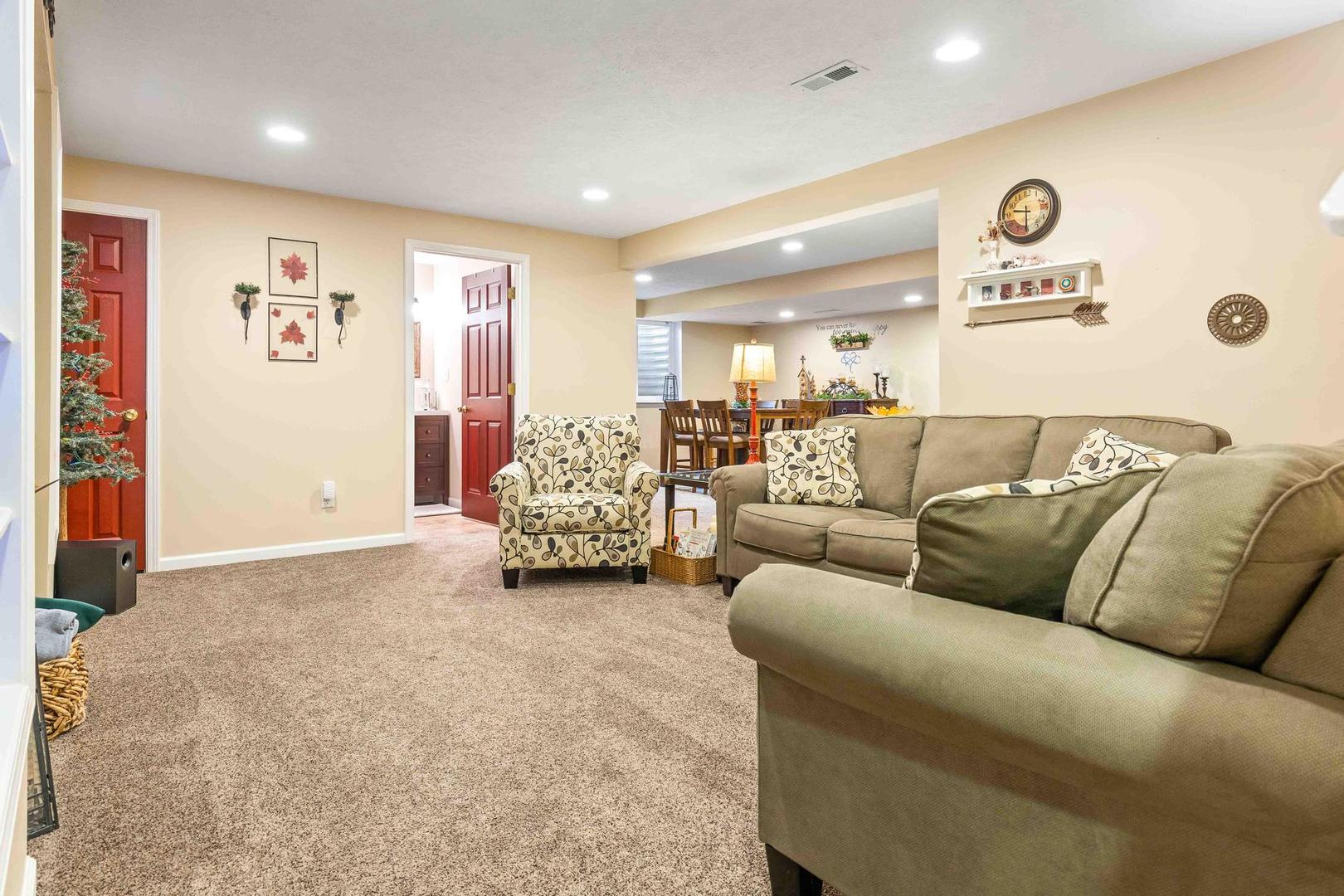 107 Labrador Lane Downs, IL 61736 - Photo 21 of 35 a living room with furniture and kitchen view