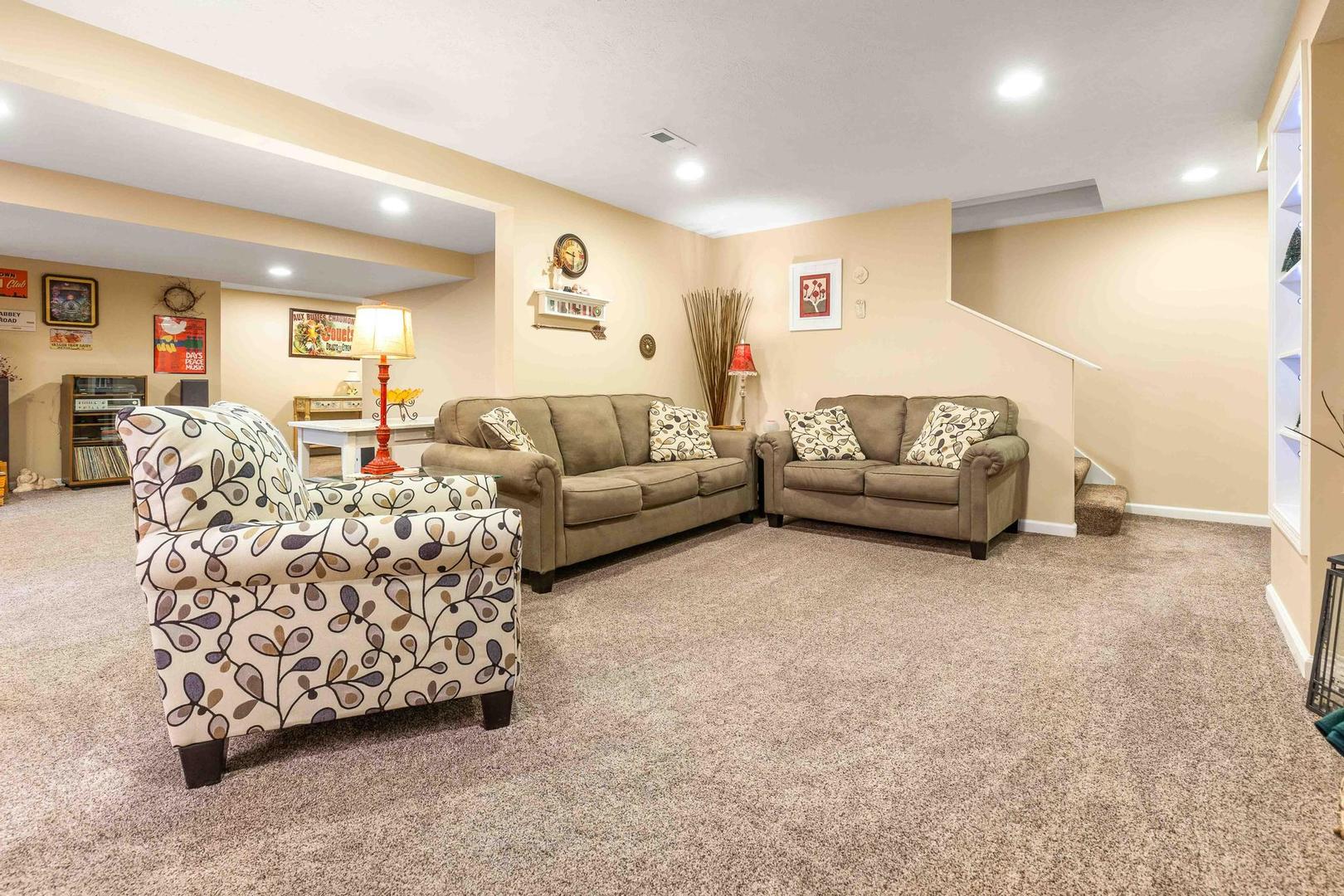 107 Labrador Lane Downs, IL 61736 - Photo 22 of 35 a living room with furniture and a large window