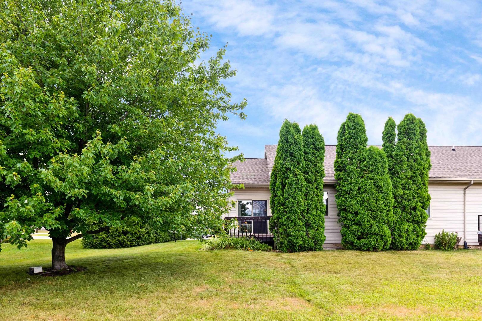 107 Labrador Lane Downs, IL 61736 - Photo 29 of 35 a view of a yard in front of a house
