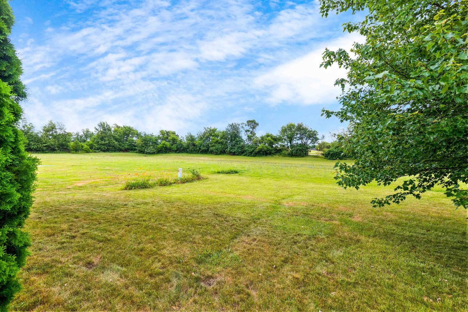 107 Labrador Lane Downs, IL 61736 - Photo 31 of 35 a view of an ocean and beach