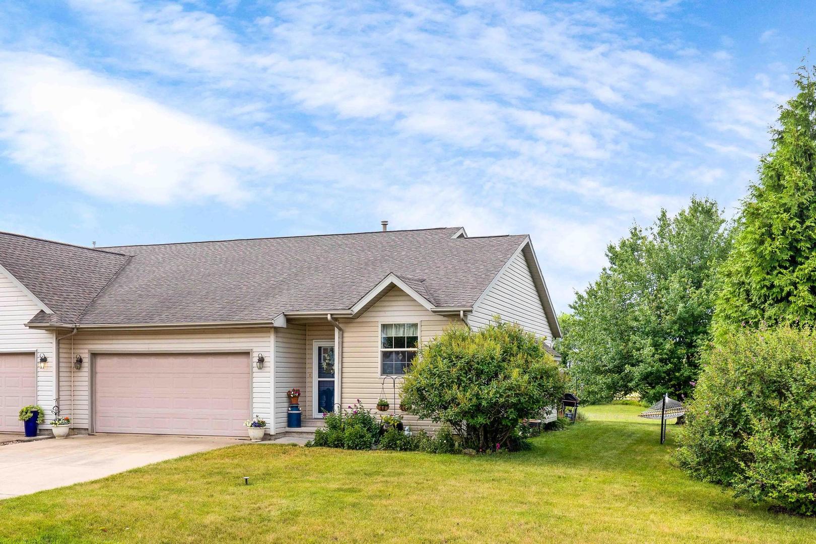107 Labrador Lane Downs, IL 61736 - Photo 35 of 35 a view of house with garden space and swimming pool