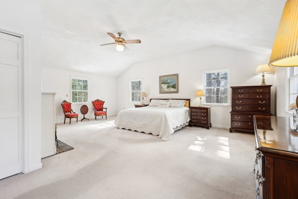 17 Wedgewood Road Stow, MA 01775 - Photo 15 of 31 a bedroom with furniture and a flat screen tv