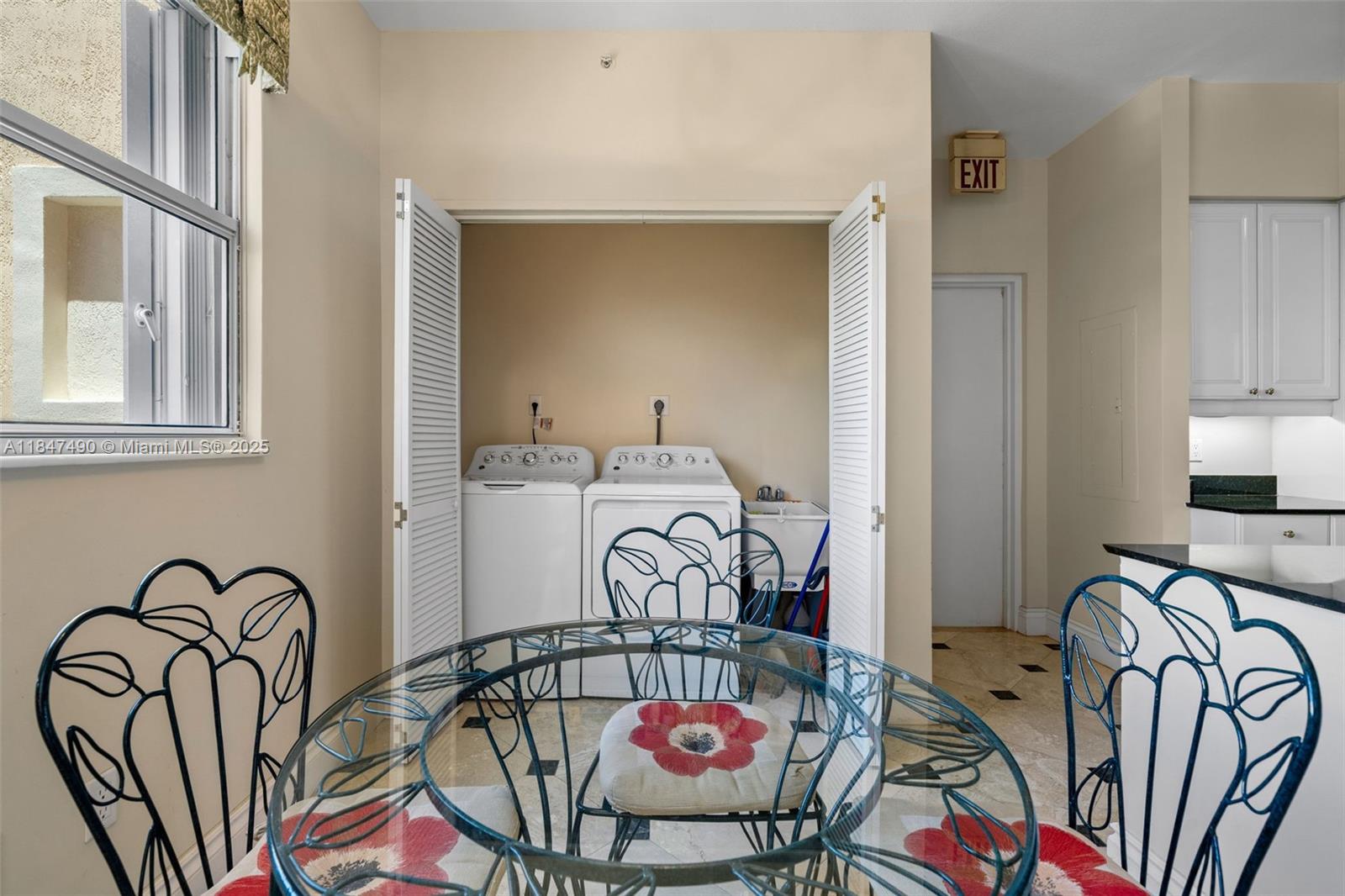 733 Crandon Boulevard, Unit 405 Key Biscayne, FL 33149 - Photo 19 of 42 a view of a bedroom with furniture