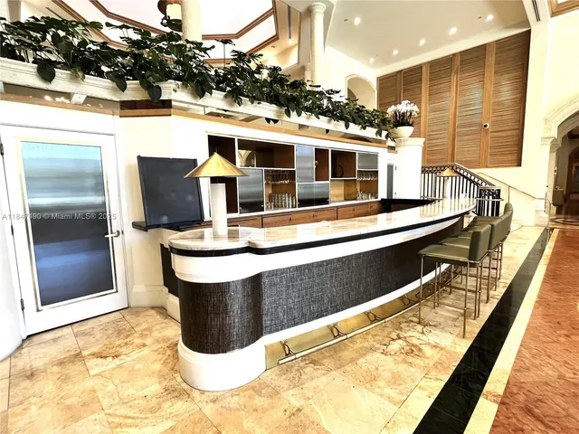 a view of balcony with furniture