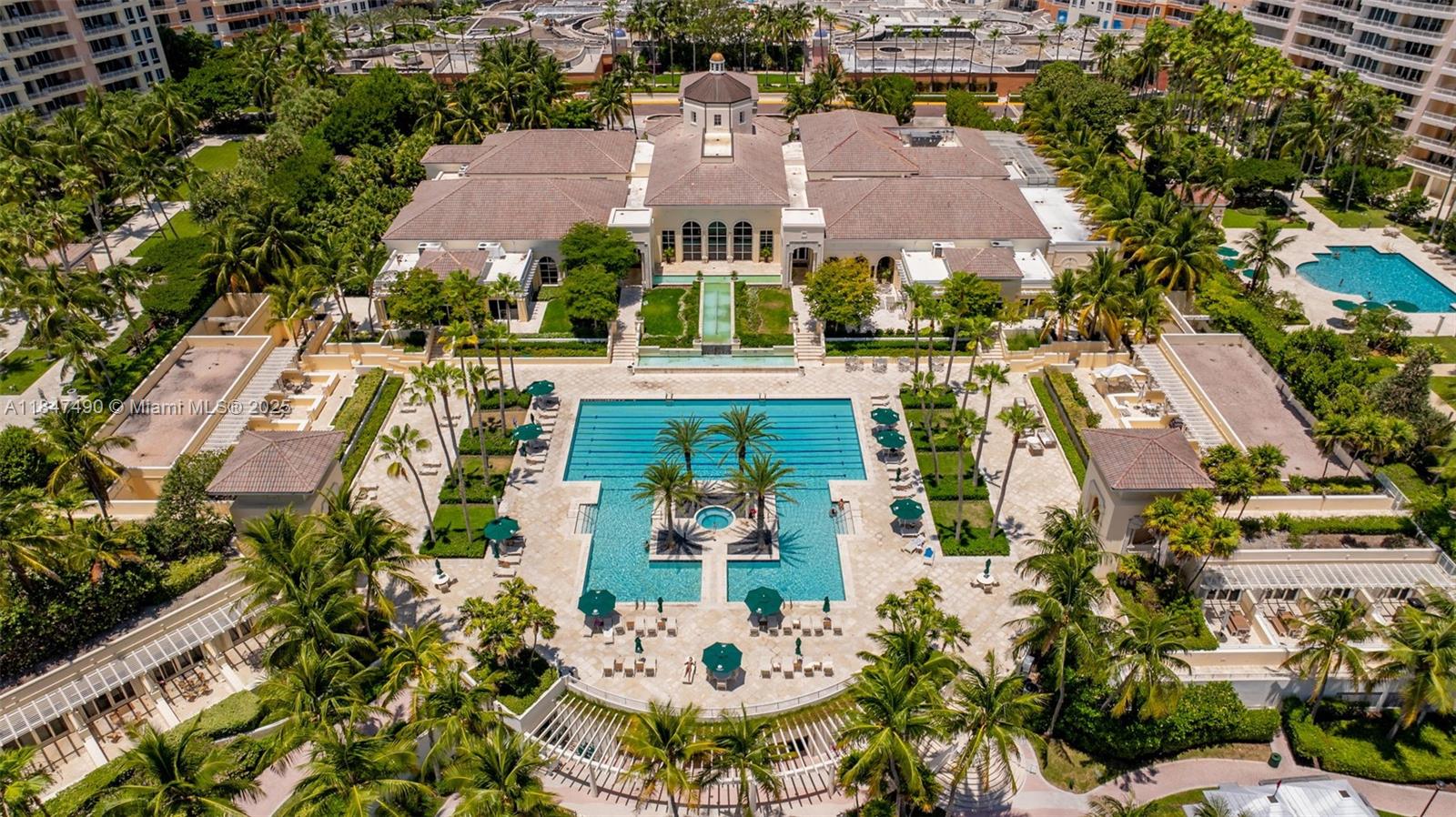 733 Crandon Boulevard, Unit 405 Key Biscayne, FL 33149 - Photo 36 of 42 an aerial view of multiple houses with yard