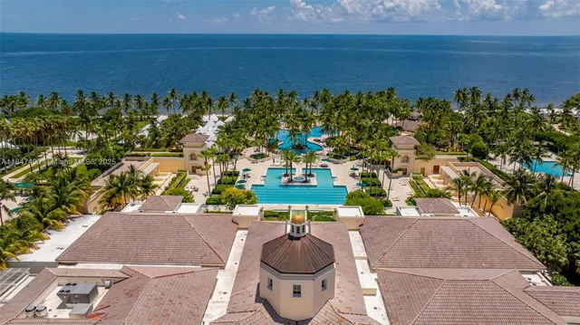 a vase of flowers sitting on a table