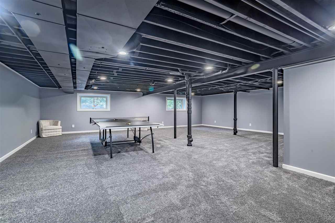 3208 Spring Creek Road Rockford, IL 61107 - Photo 29 of 45 a view of an empty room with a chair