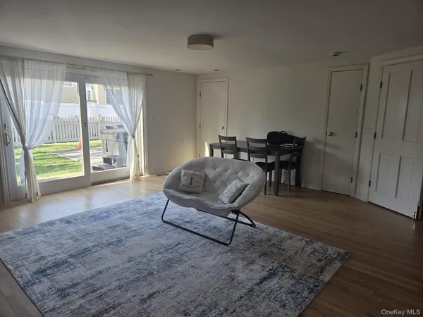 a living room with furniture and a gate