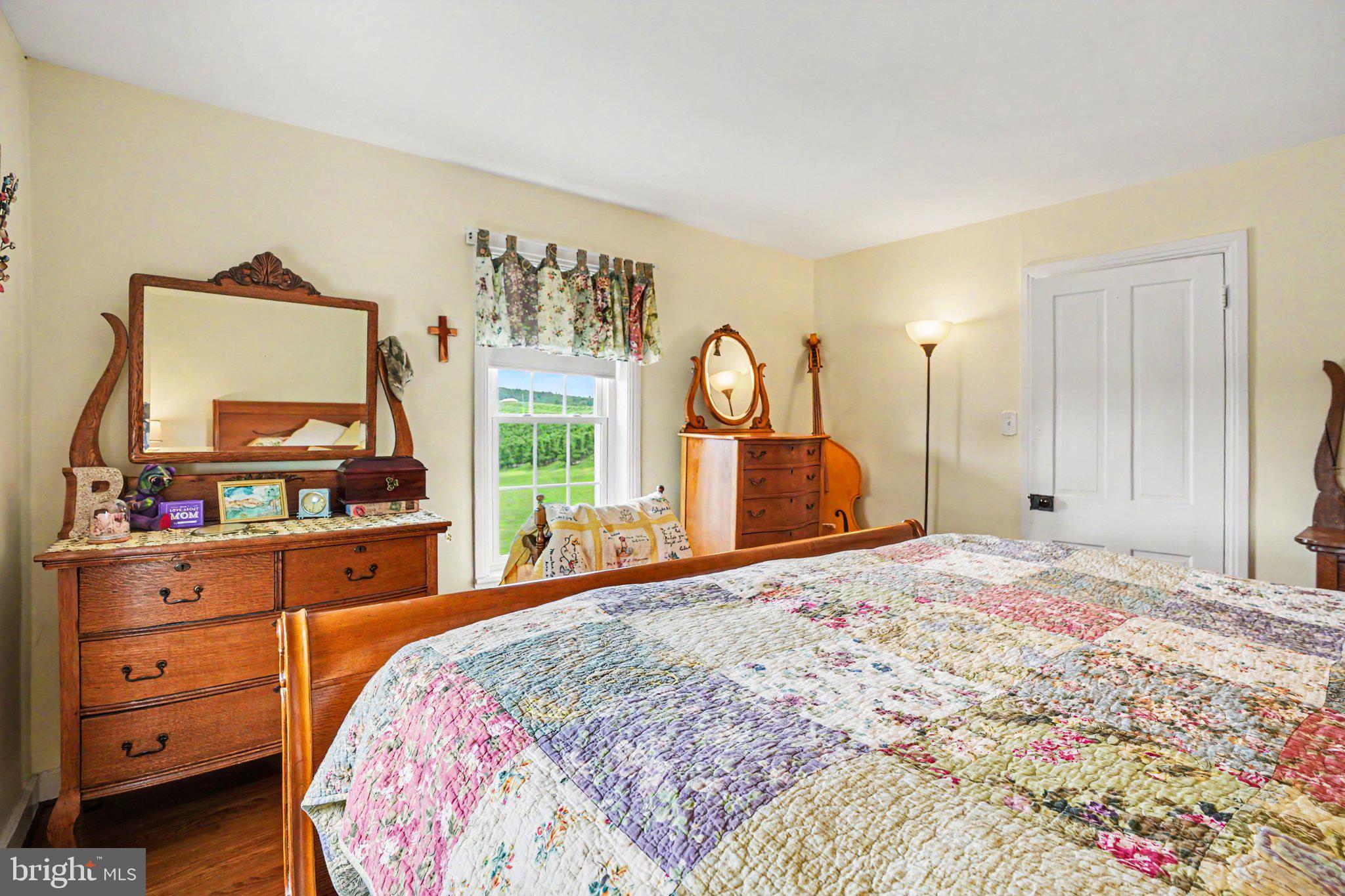420 Carlisle Road Biglerville, PA 17307 - Photo 22 of 41 a bedroom with a bed and a dresser in it