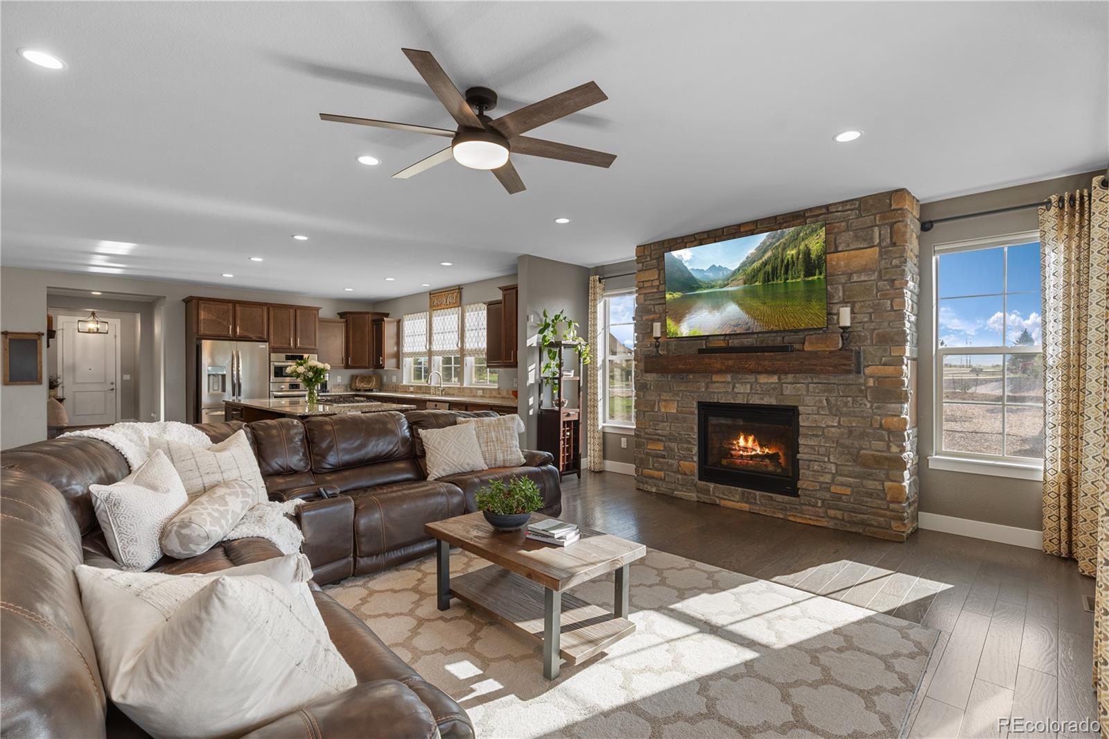 5181 Appleton Way Castle Rock, CO 80104 - Photo 14 of 44 a living room with furniture and a fireplace