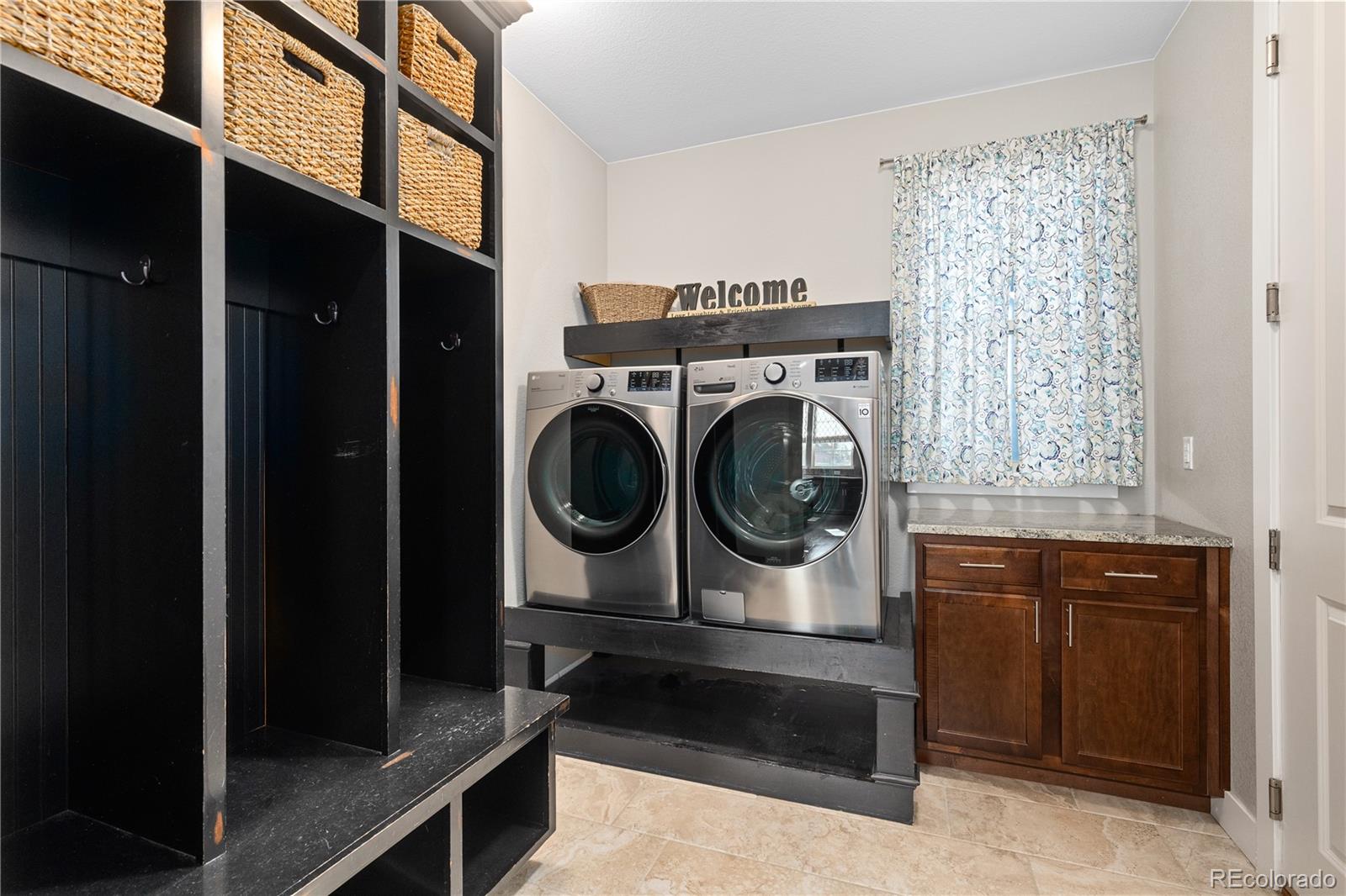 5181 Appleton Way Castle Rock, CO 80104 - Photo 25 of 44 a utility room with dryer and washer
