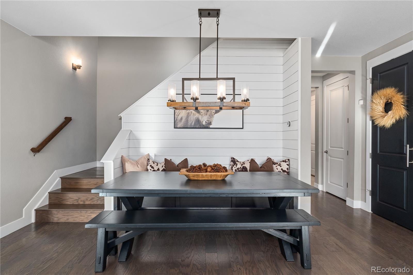 5181 Appleton Way Castle Rock, CO 80104 - Photo 26 of 44 a view of entryway dining room and wooden floor