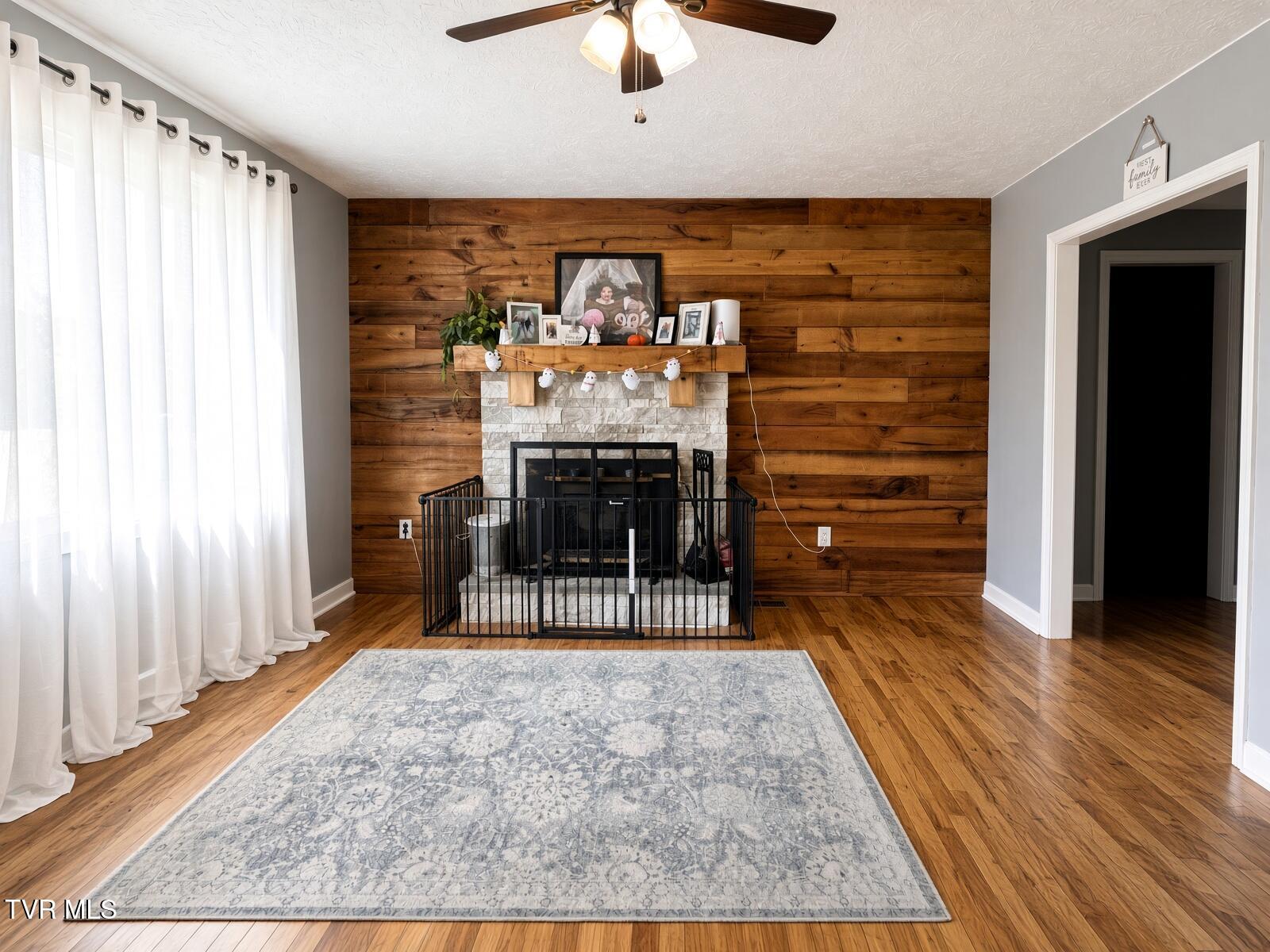 230 Reece Hill Road Mountain City, TN 37683 - Photo 7 of 15 08 - Living Room - Fireplace