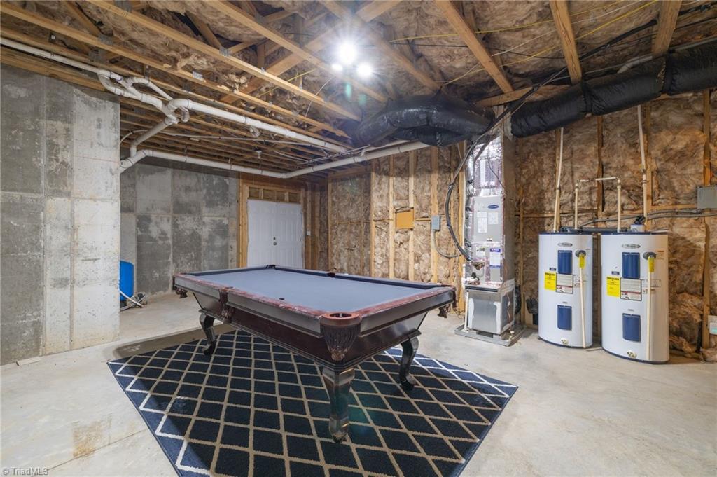 9127 County Line Road Kernersville, NC 27284 - Photo 32 of 49 Unfinshes Basement Storage