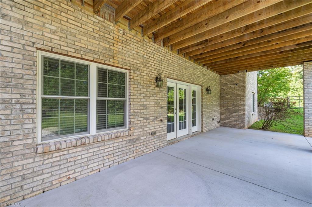 9127 County Line Road Kernersville, NC 27284 - Photo 39 of 49 Basement Patio Area Exit