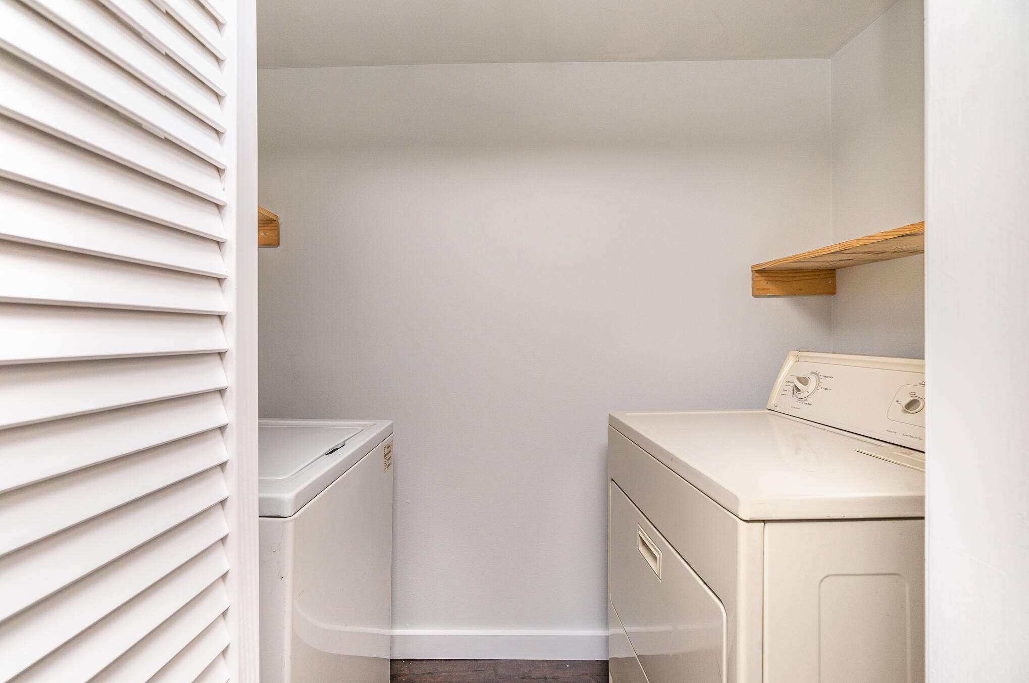 598 North Wickham Road, Unit 75 Melbourne, FL 32935 - Photo 17 of 21 a utility room with dryer and washer