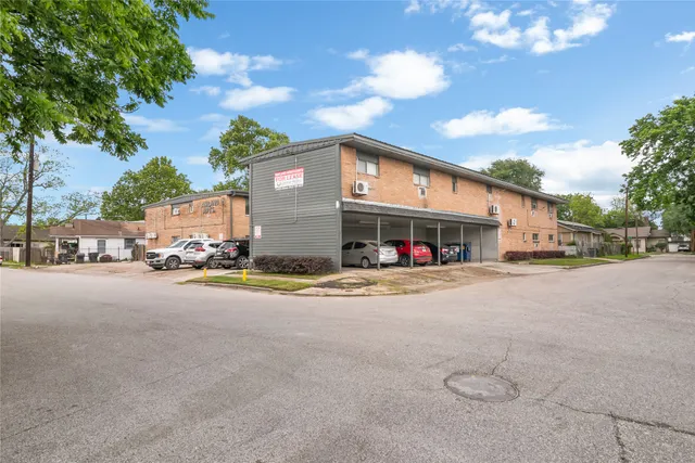 a view of a street with cars