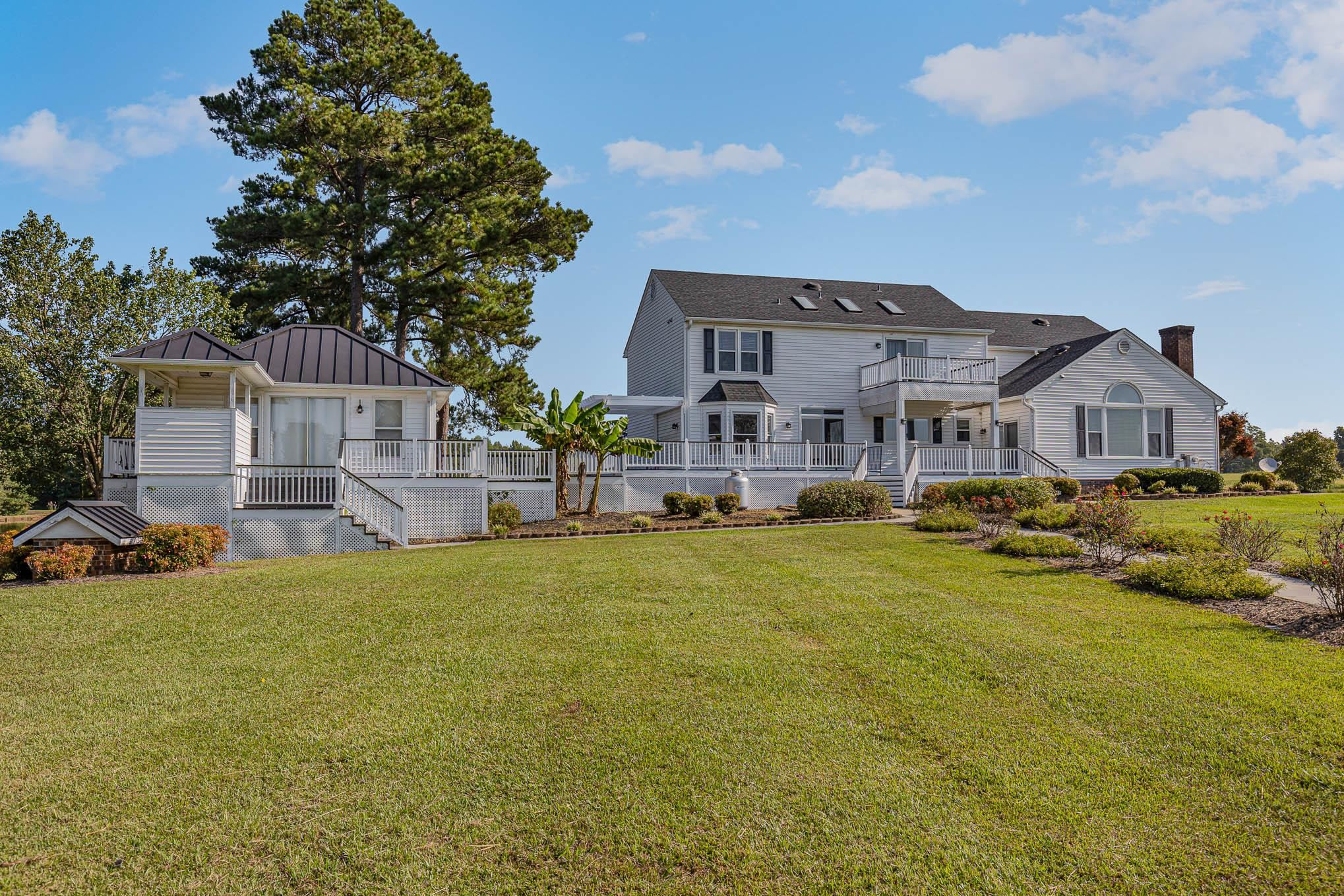 3591 Zacks Mill Road Angier, NC 27501 - Photo 33 of 44 a front view of house with yard and seating