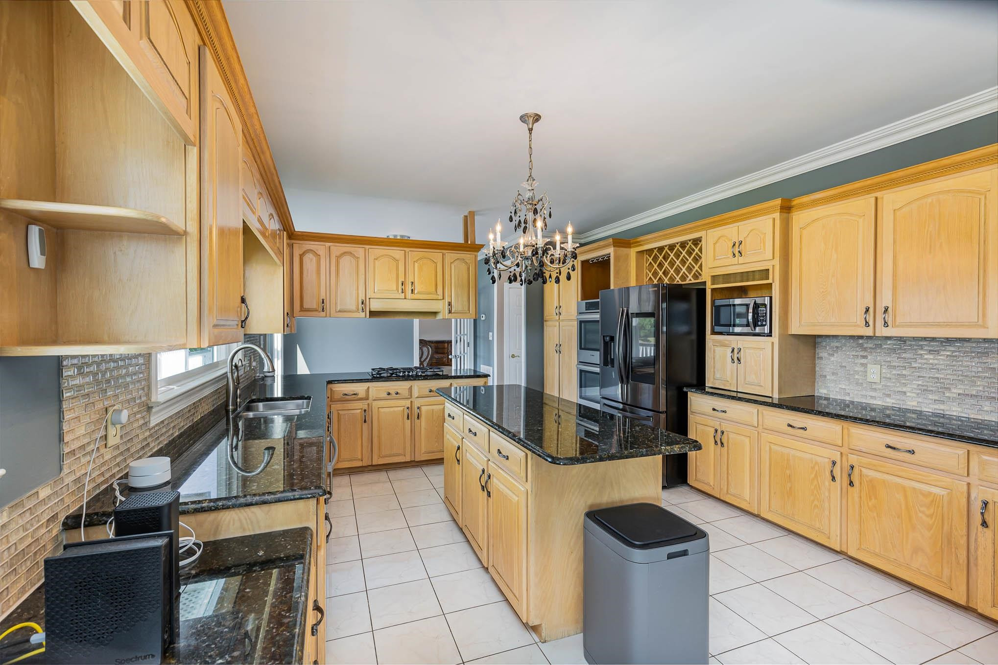 3591 Zacks Mill Road Angier, NC 27501 - Photo 6 of 44 a large kitchen with a large window