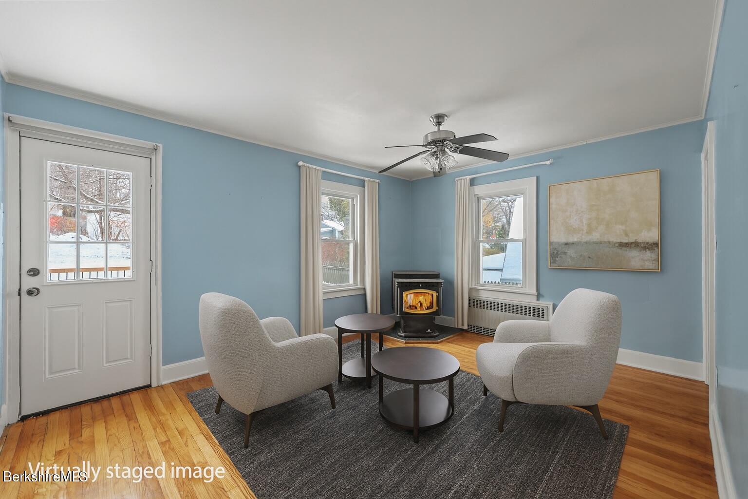 125 Hancock Road Pittsfield, MA 01201 - Photo 12 of 38 Sitting room with wood stove VS