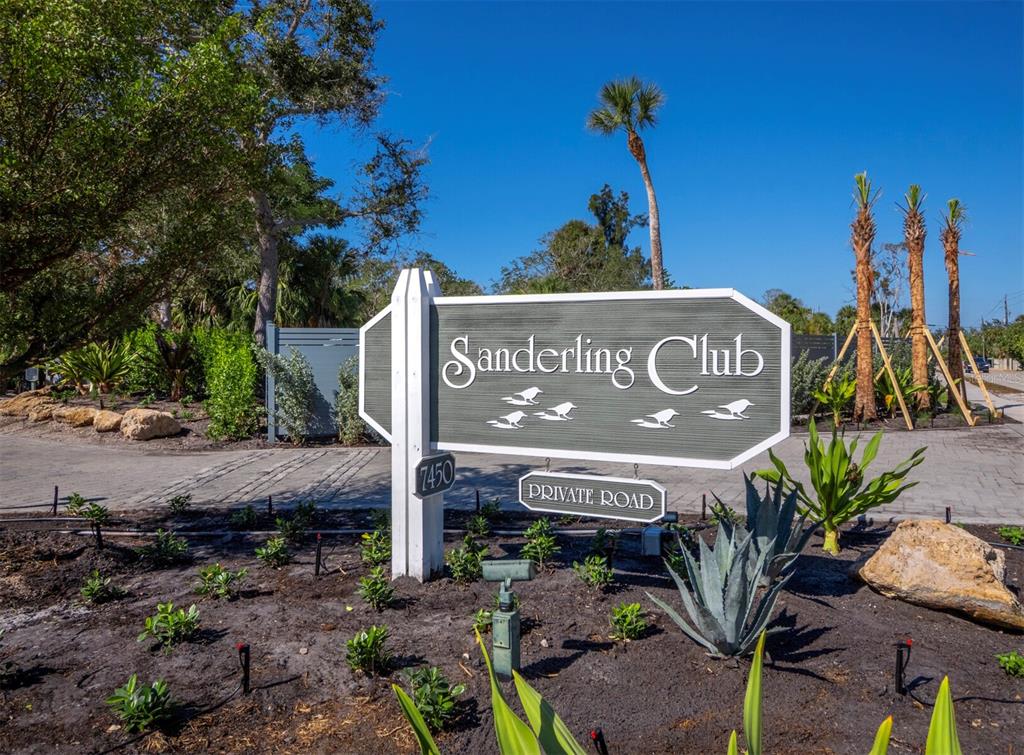7233 Pine Needle Road Sarasota, FL 34242 - Photo 17 of 49 a view of outdoor space with sign board