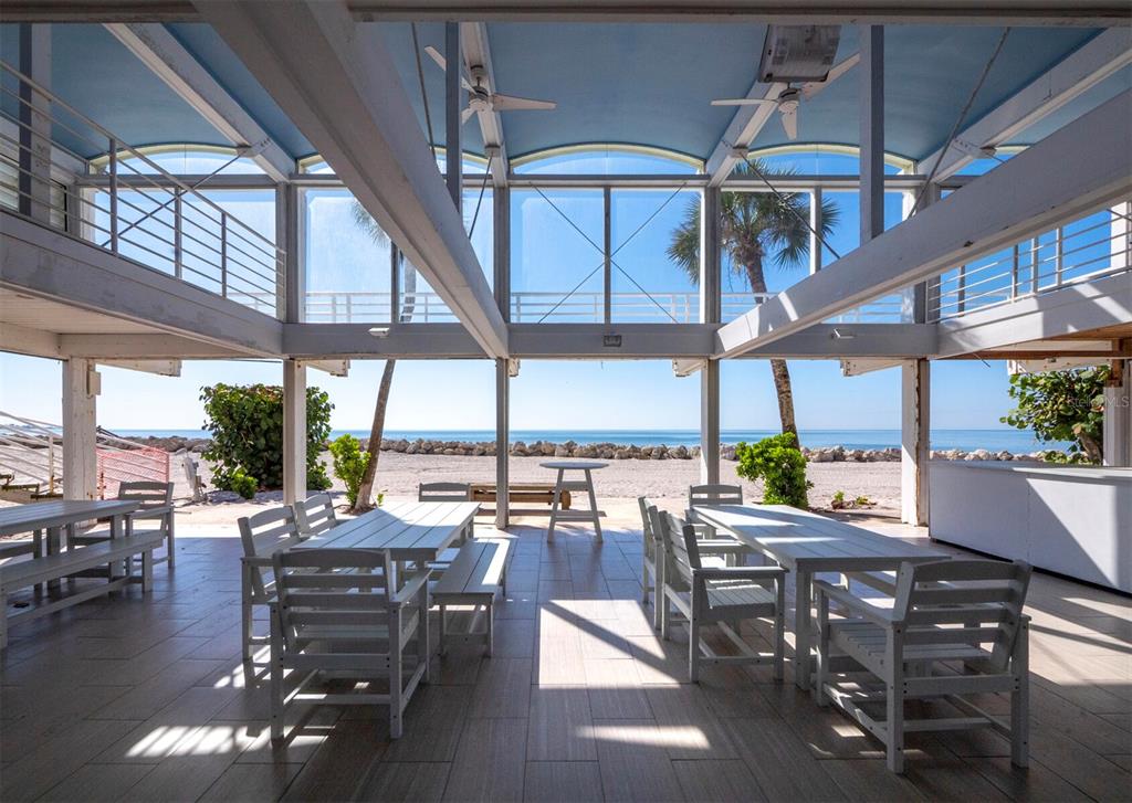 7233 Pine Needle Road Sarasota, FL 34242 - Photo 21 of 49 a outdoor space with patio lots of furniture and garden view