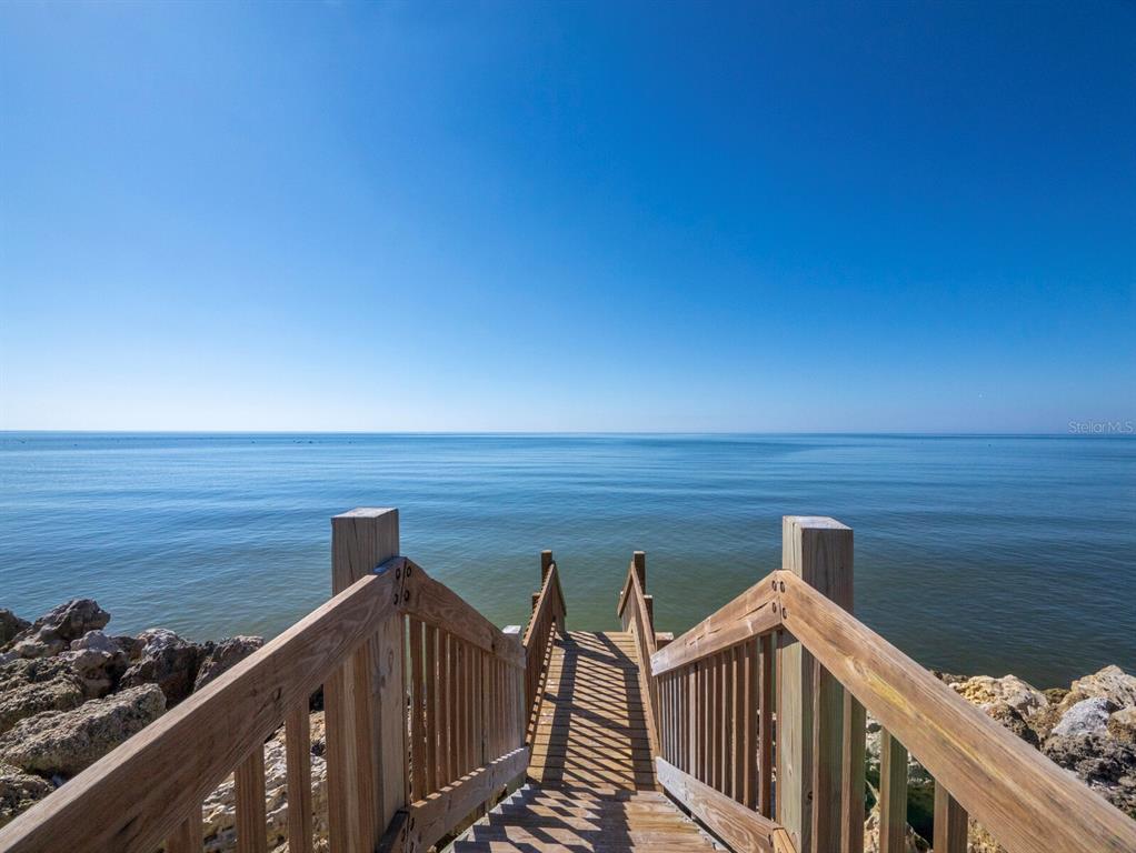 7233 Pine Needle Road Sarasota, FL 34242 - Photo 23 of 49 a view of deck and ocean