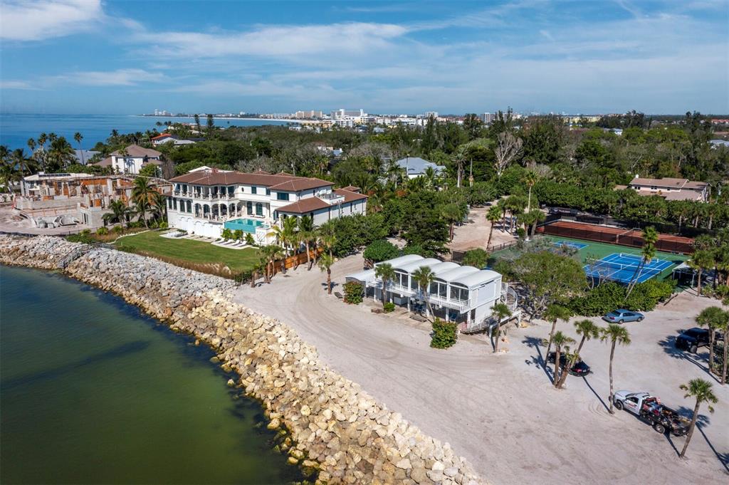 7233 Pine Needle Road Sarasota, FL 34242 - Photo 24 of 49 a view of a lake with a city