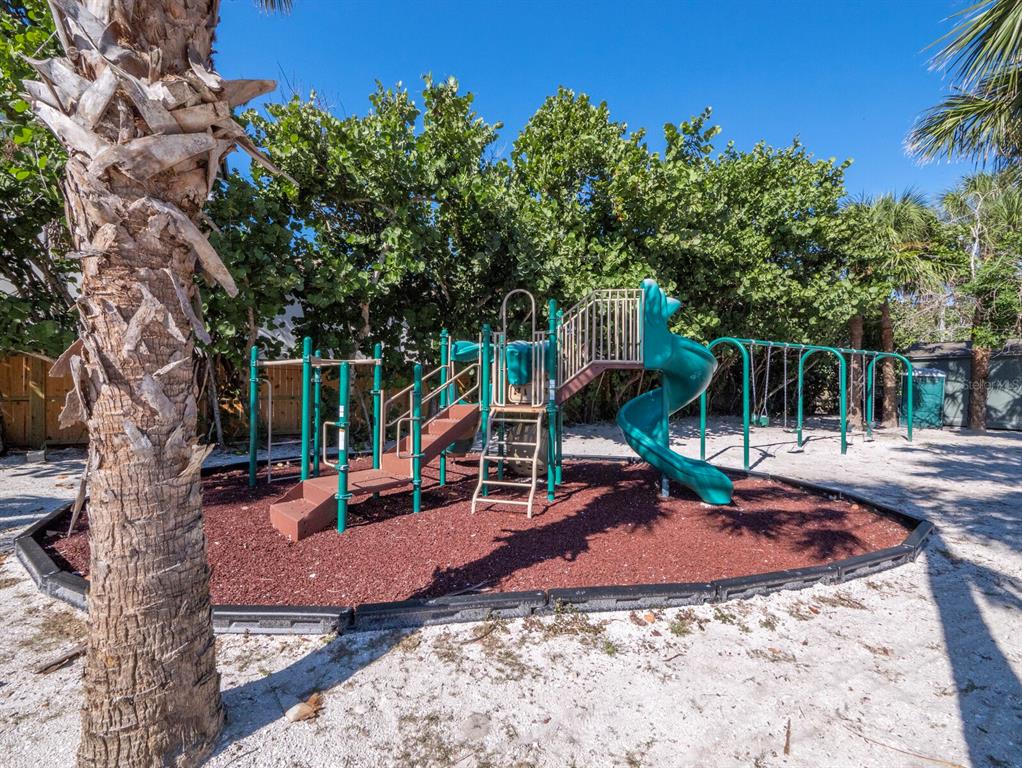 7233 Pine Needle Road Sarasota, FL 34242 - Photo 31 of 49 a view of a park with swings