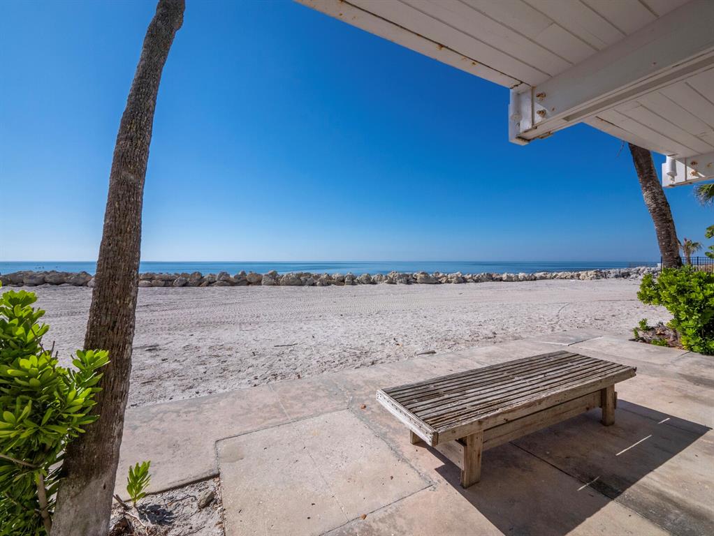7233 Pine Needle Road Sarasota, FL 34242 - Photo 32 of 49 a view of a terrace with seating area