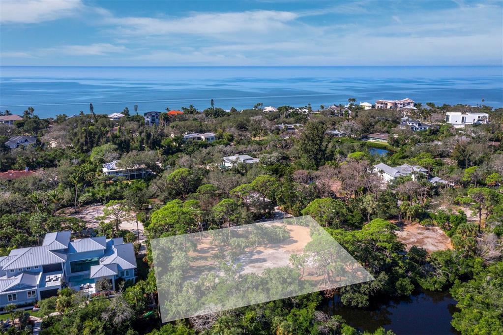 7233 Pine Needle Road Sarasota, FL 34242 - Photo 43 of 49 an aerial view of residential houses with outdoor space