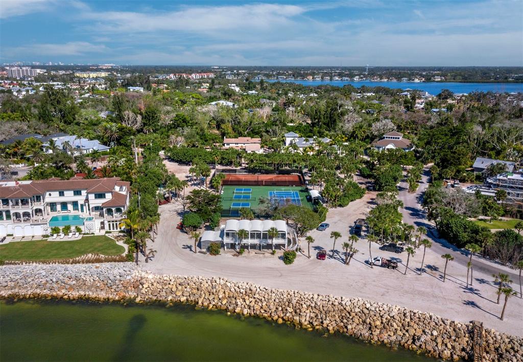7233 Pine Needle Road Sarasota, FL 34242 - Photo 48 of 49 a view of a city with lawn chairs